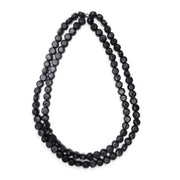 POLKA LUKA Silk Road double strand necklace featuring black resin beads with subtle white marbling on elastic cord.