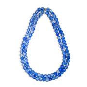 POLKA LUKA Silk Road double strand necklace featuring translucent blue resin beads on a stretch elastic cord.