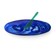 POLKA LUKA oval blue marbled resin serving platter with a matching translucent green cheese knife