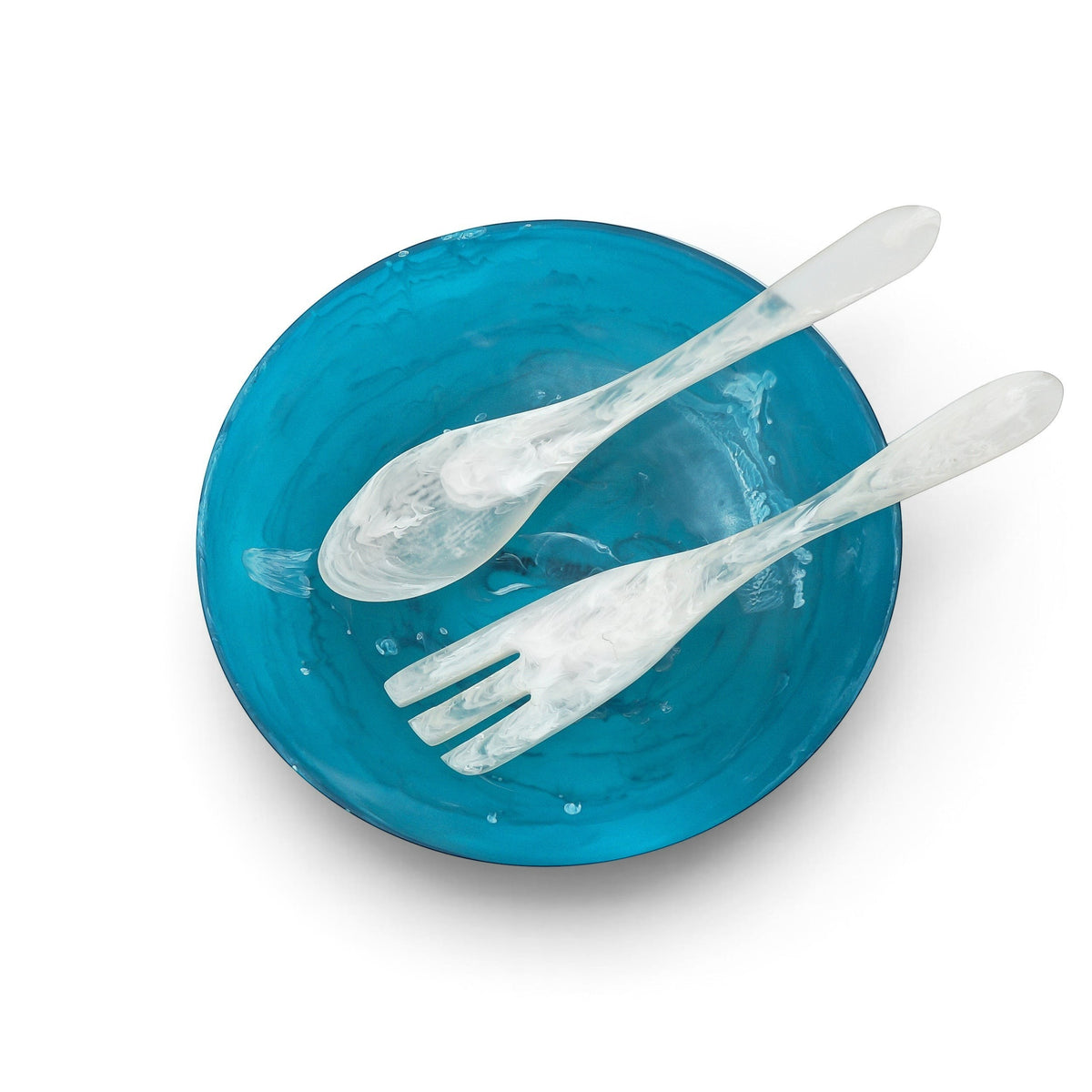 POLKA LUKA large blue resin salad bowl with matching white marbled resin salad servers, top-down view.