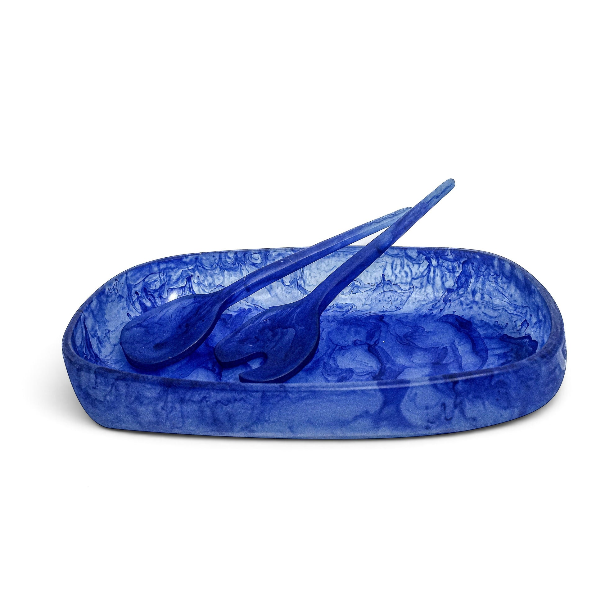 POLKA LUKA Cezanne resin serving bowl and Gauguin salad servers in a vibrant blue marbled pattern.