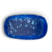 POLKA LUKA Cezanne rectangular resin serving bowl in deep blue with white marbled swirl patterns, top-down view.
