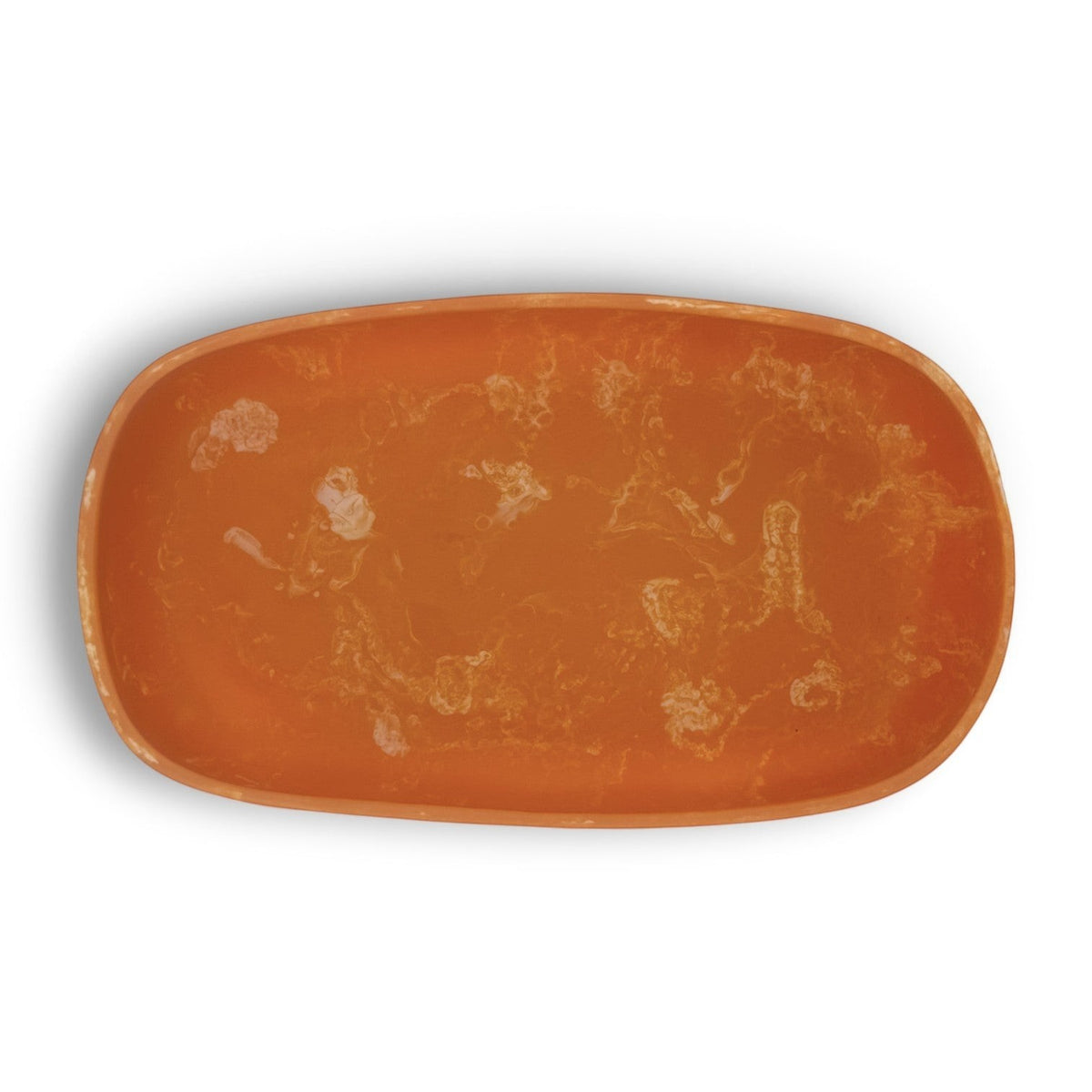 POLKA LUKA Cezanne rectangular resin serving bowl in a marbled burnt orange finish with a smooth, organic shape.
