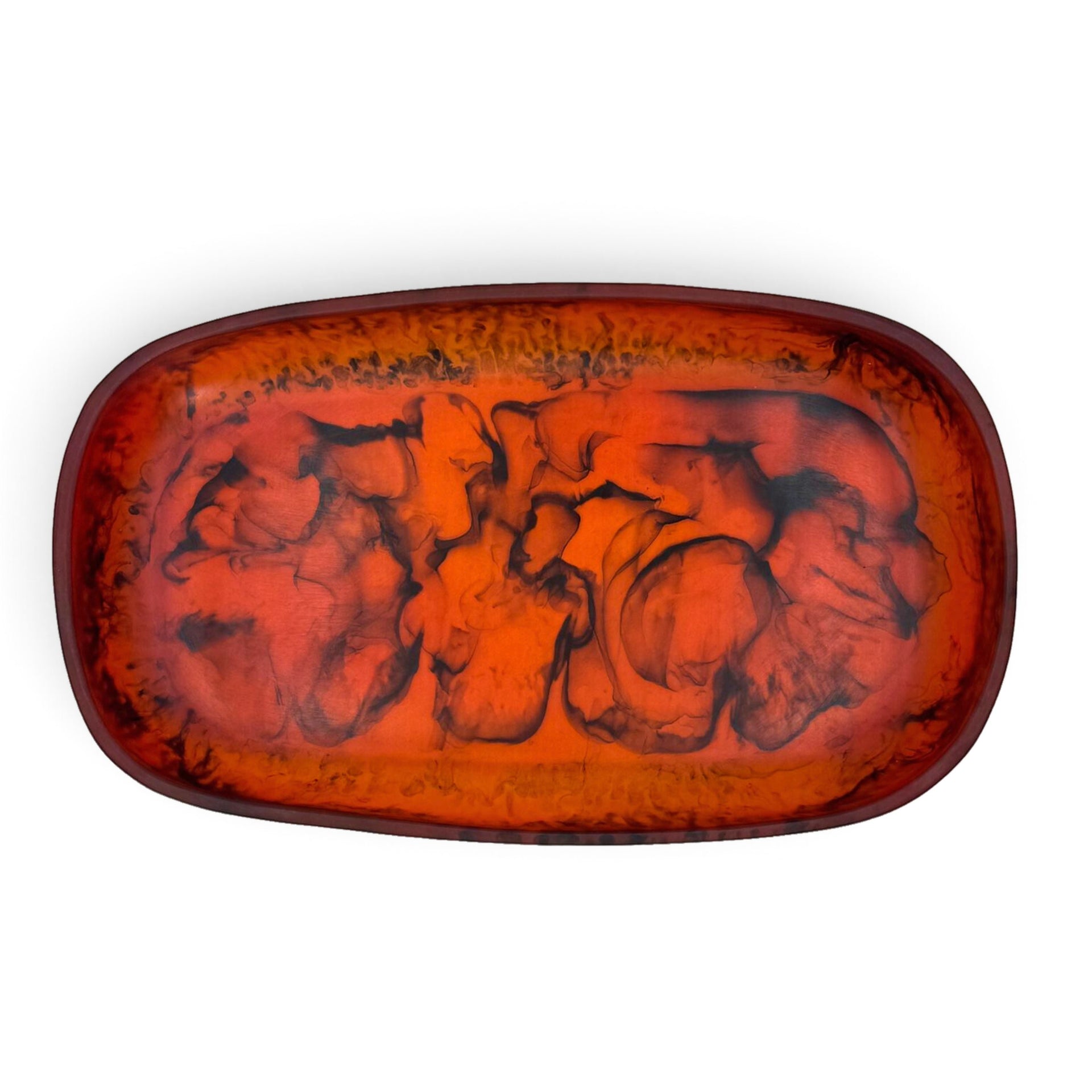 POLKA LUKA Cezanne rectangular resin serving bowl in a vibrant orange and black marbled pattern, top-down view.