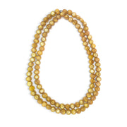 POLKA LUKA double strand necklace featuring golden resin beads on a stretch elastic cord, 58cm length.