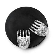POLKA LUKA large black Luna resin serving plate with marbled white resin salad hands for serving food.