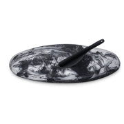 POLKA LUKA oval black and white marbled resin serving platter with a matching black cheese knife
