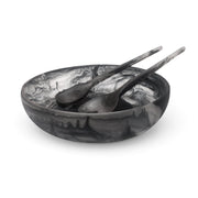 POLKA LUKA medium salad bowl and Gauguin server set in a marbled black and white resin finish.