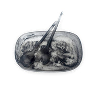 POLKA LUKA Cezanne resin serving bowl and Gauguin salad servers in a marbled black and white swirl pattern.