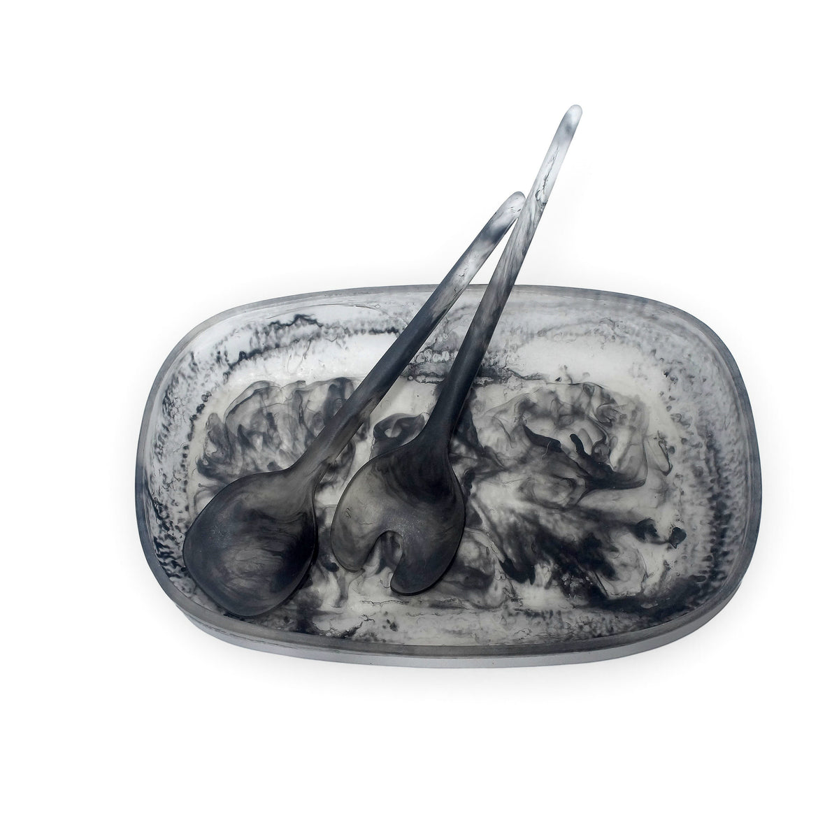 POLKA LUKA Cezanne resin serving bowl and Gauguin salad servers in a marbled black and white swirl pattern.
