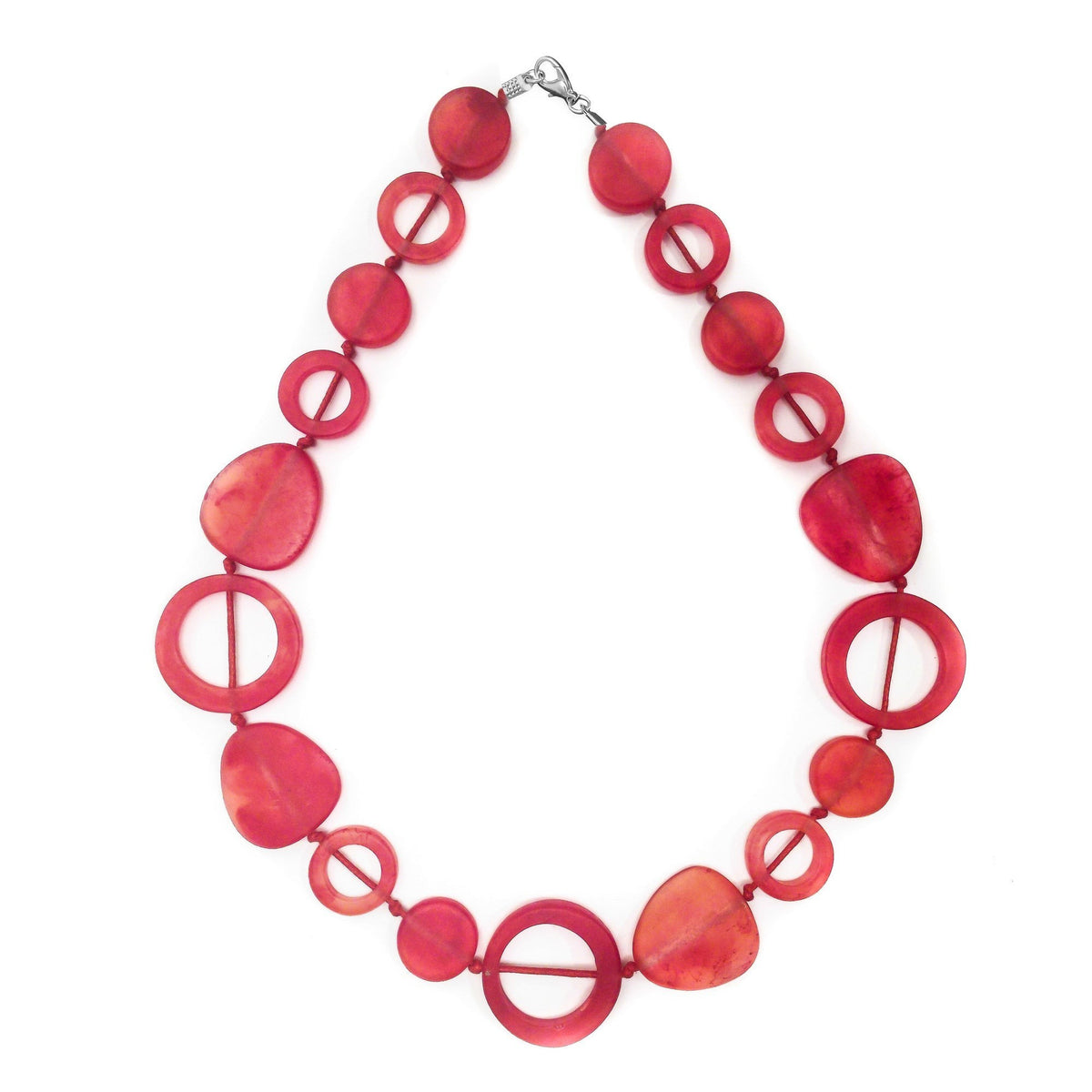 POLKA LUKA Tangier necklace featuring red resin geometric shapes on a cotton cord, 54cm length.