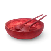 POLKA LUKA medium red resin salad bowl with matching Gauguin serving spoons, featuring a unique hand-mixed pattern.
