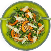 POLKA LUKA medium resin salad bowl and matching Gauguin servers filled with a fresh pumpkin, walnut, and arugula salad