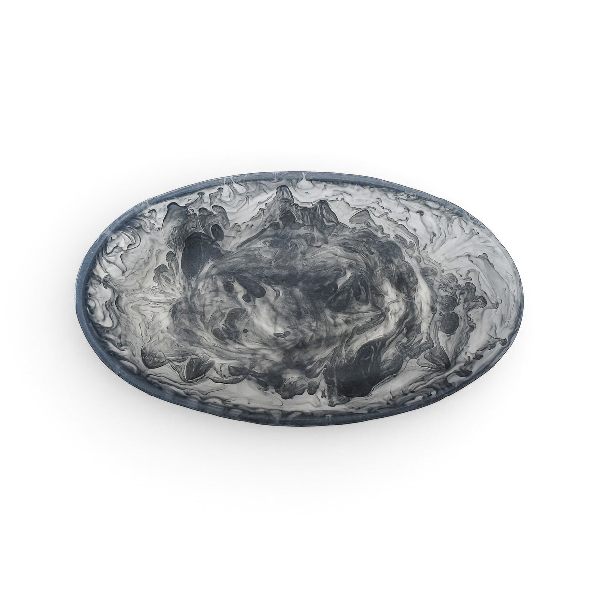 POLKA LUKA small oval resin bowl featuring a black and white marbled swirl pattern for jewellery or food serving.