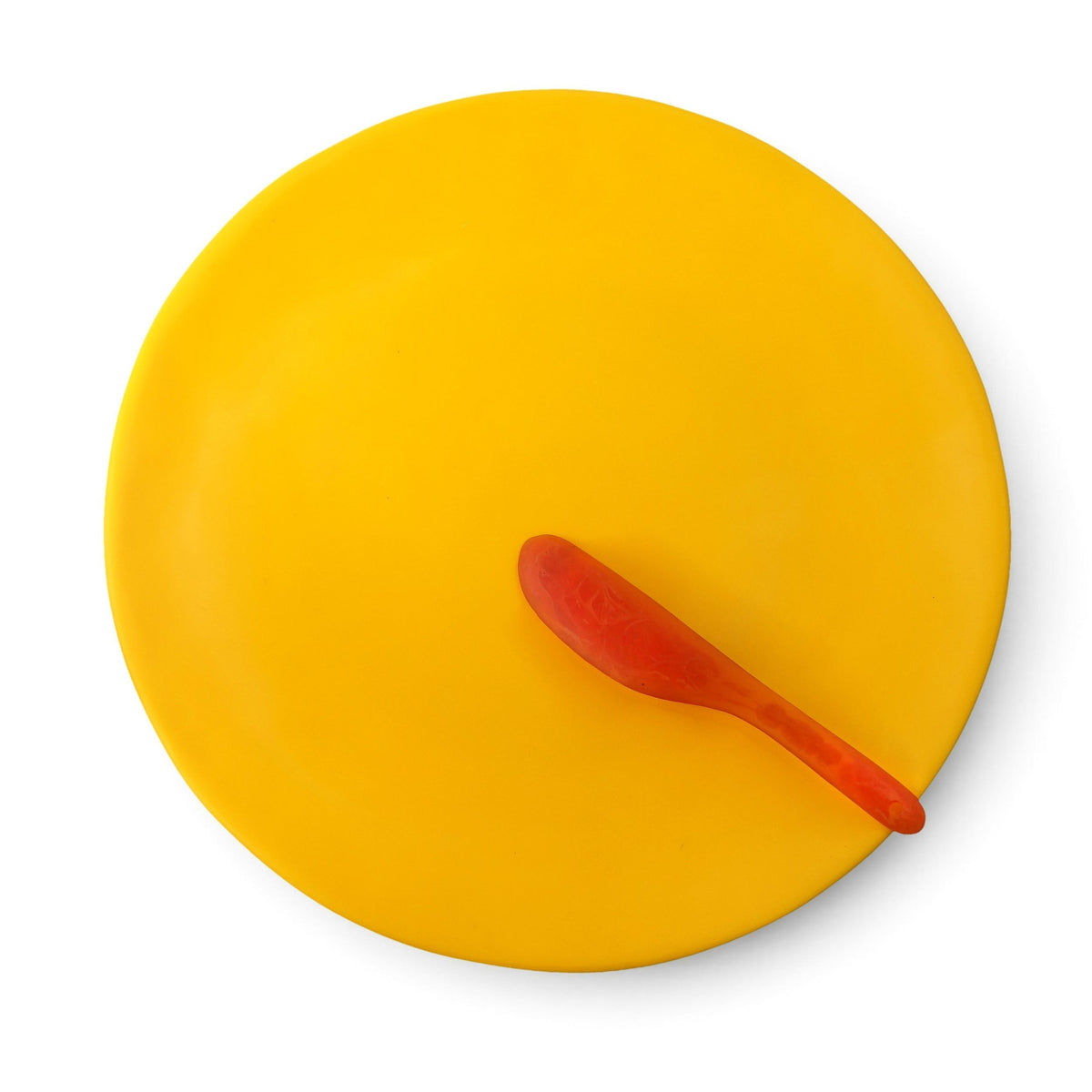 POLKA LUKA large yellow resin Luna serving plate with a matching orange resin cheese knife, top-down view.